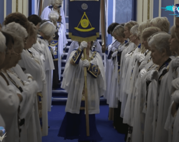 People inside a Masonic Lodge during a secret ceremony.