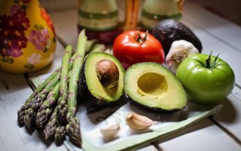 Image of various colorful vegetables on a wooden cutting board, representing the benefits of a vegan diet on the brain.