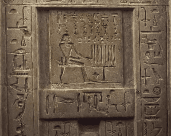 An old Egyptian stone depicting hieroglyphs and symbols, representing the complex and fascinating topic of Egyptian spirituality