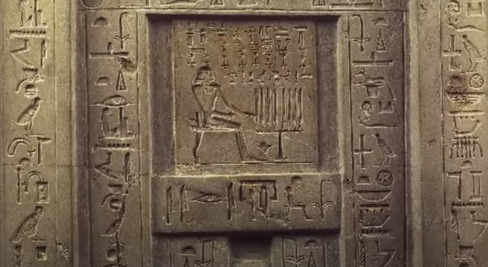 An old Egyptian stone depicting hieroglyphs and symbols, representing the complex and fascinating topic of Egyptian spirituality