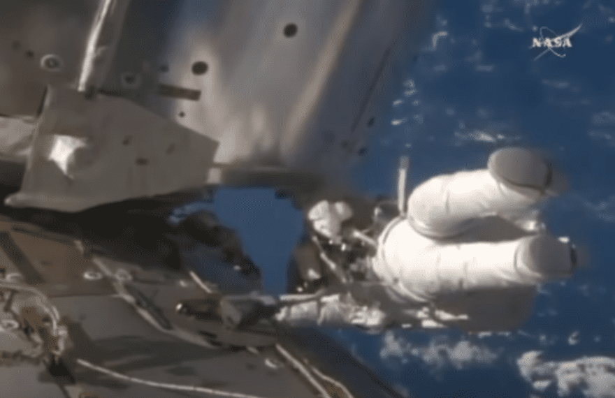 Astronaut in space performing a spacewalk