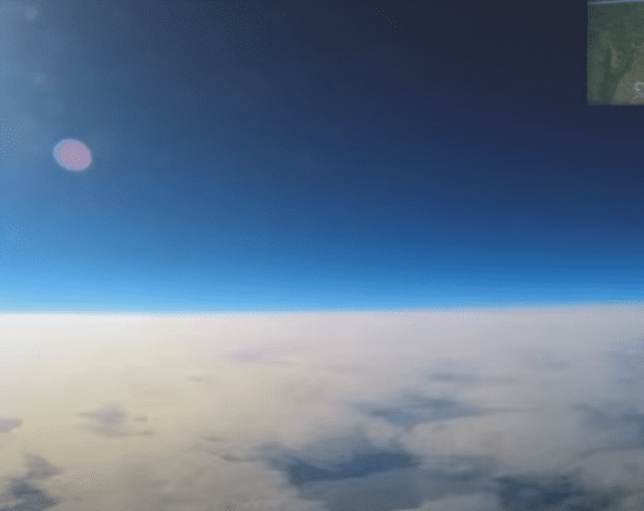 Aerial view from a plane showing a flat horizon, providing evidence that the world is not a globe