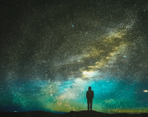 Man stargazing, night sky, personal growth, universal connection