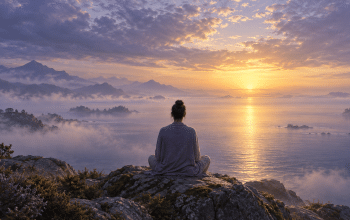 Illustration of a seated person contemplating a still sea at sunrise, evoking spiritual awakening and presence.